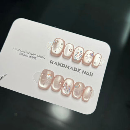 Handmande pearlscent press in Nail
